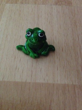 Frosch kniend